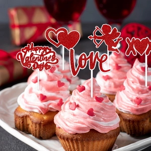 Close-up of red glitter heart cupcake toppers for Valentine's Day party decorations