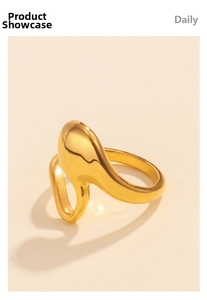 Macro shot of irregular 18K gold plated stainless steel ring with organic molten shape