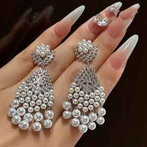 Silver needle chandelier earrings with cascading pearls and water-drop rhinestones