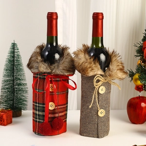 Christmas wine bottle covers with red plaid, brown faux fur collar and bow decorations