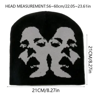 Detailed size chart showing dimensions of the knitted beanie with a jacquard face pattern
