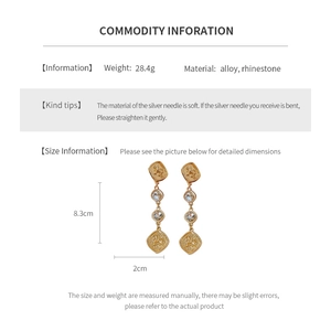 Detailed size specifications of vintage lion tassel earrings with gold alloy and rhinestones