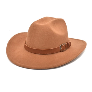 Macro detail of the felt wool cowboy hat with adjustable leather band and metal buckle