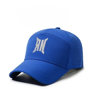 Detail of royal blue baseball cap featuring laser-cut breathable holes and AN logo