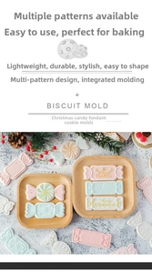 Macro detail of Christmas themed fondant molds featuring Merry Christmas snowflake patterns