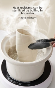 Detail of leaf-shaped heat resistant mat being sanitized in boiling water for hygiene