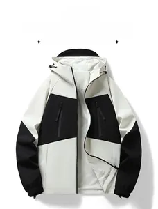 Detail of a color-block hooded jacket with zippered pockets and adjustable drawstrings
