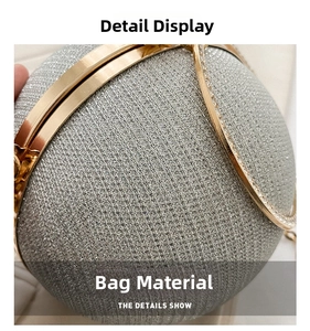 Detailed macro view of the silver glitter fabric and golden metal frame on this spherical bag