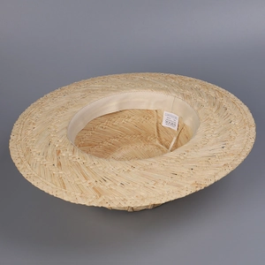 Detail view of 100% Raffia boater hat interior with inner band and adjustable ribbon