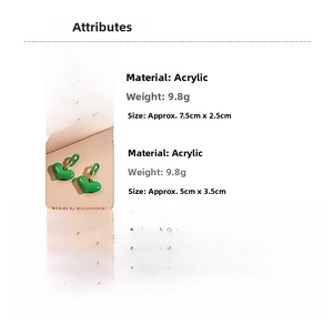 Detail view of green acrylic rectangle and heart earrings with precise dimensions