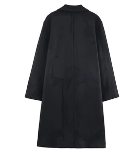 Detail view of the back of a black suede-effect long coat with minimalist casual tailoring