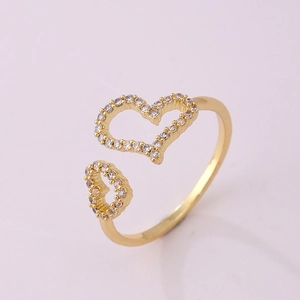Detail of 18K gold open ring with double interlocking paved zircon heart shapes