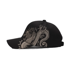 Black baseball cap featuring intricate gold dragon embroidery on the side for a stylish look