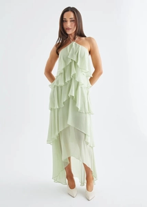 Detail of light green ruffled chiffon fabric and layered halter neckline on maxi dress