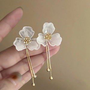 Elegant white floral tassel earrings with golden chains and resin petals for women