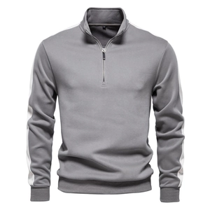Detail of grey half-zip sweatshirt showing stand collar, white sleeve stripes, and S size tag