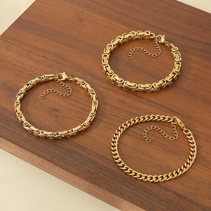 Set of three 18K gold plated stainless steel bracelets in different vintage link designs
