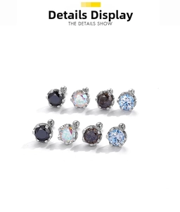 Detailed view of eight round six-prong stud earrings in multiple assorted colors