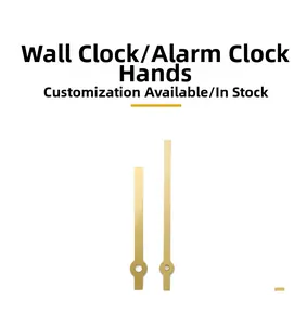 Detail view of gold-colored metal clock hands for wall clocks and alarm clocks repair
