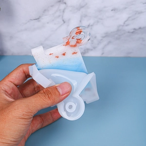 Flexible silicone mold for DIY resin storage box showing easy demolding process