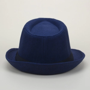 Close-up view of a classic blue wool felt pork pie hat with black ribbon band detail