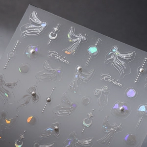 3D relief nail art stickers with ribbons, pearls, and moon patterns in polar white finish