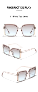 Detail view of square sunglasses with blue-brown gradient lenses and gold metal accents