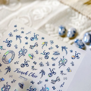 Holographic French Chic nail art stickers featuring blue butterfly and floral designs