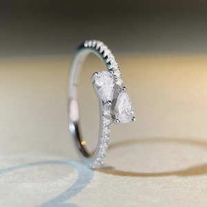Elegant S925 silver pear-cut moissanite crown ring with shimmering pave setting
