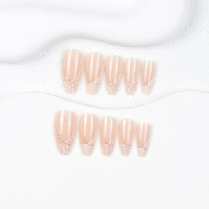 Almond press-on nails set with nude base, white French tips and silver glitter accents