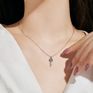 S925 sterling silver evil eye key necklace with blue and white crystals for women