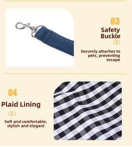 Detail of pet bag showing a secure zinc alloy hook and a soft black-white plaid lining