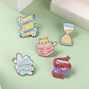 5-piece enamel pin set with scholar cat and magic book themes for book lovers