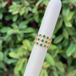 Adjustable 18K gold plated mesh ring featuring three rows of sparkling green zircon stones