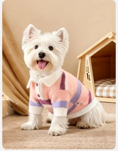 Detail of pink and purple striped pet polo sweater with mohair texture on a dog