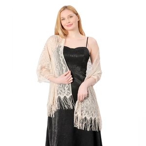 Close-up of beige lace shawl with intricate floral patterns and long fringe details