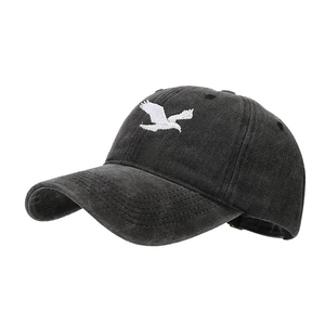 Vintage washed dark grey baseball cap with white eagle embroidery and distressed cotton finish