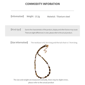 Détail du collier en pierre œil de tigre et perles d'eau douce avec infos sur la longueur