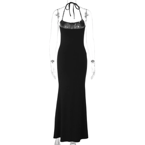 Detailed back view of a black halter neck backless dress with a slim fit mermaid hem