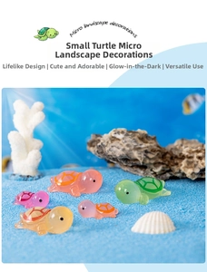 Luminous resin mini turtles in assorted colors on blue sand with seashells and coral