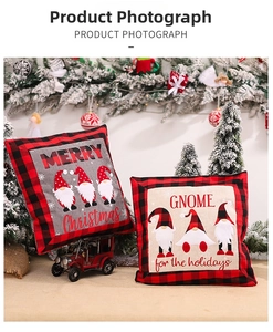 Detailed view of Christmas gnome pillowcases featuring red buffalo plaid borders