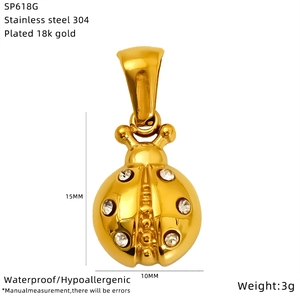 Detailed view of 18k gold plated ladybug pendant with 15mm height and dimensions
