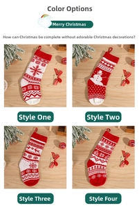 Detailed close-up of four knitted Christmas stockings with snowflake and reindeer patterns
