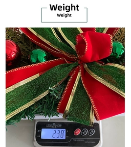 Weight measurement of a Christmas wreath featuring sequins bows and colorful ornaments