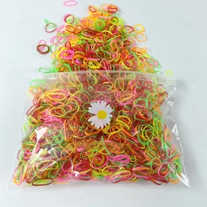 Assorted colorful mini elastic hair bands for girls in transparent packaging bag
