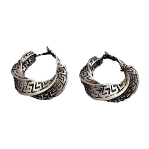 Vintage silver hollowed twist earrings featuring a classic Greek meander pattern