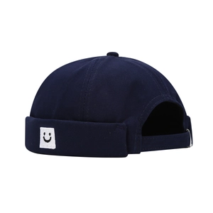 Navy blue cotton docker hat with square smiley face embroidery and metal buckle