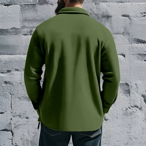 Rear view of an army green long sleeve shirt jacket with a turn-down collar on a model