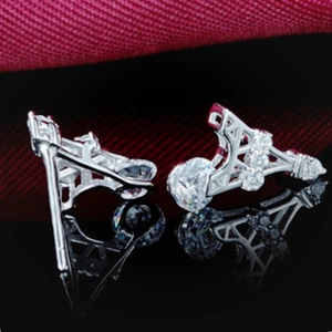 Elegant Eiffel Tower stud earrings in silver finish with sparkling cubic zirconia crystals