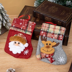 Christmas stocking set with Santa and reindeer motifs for holiday tree decorations